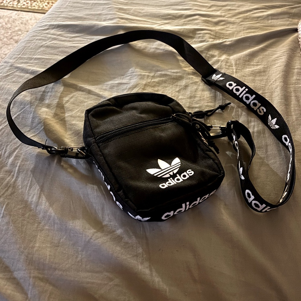 Black and white Adidas crossbody adjustable purse